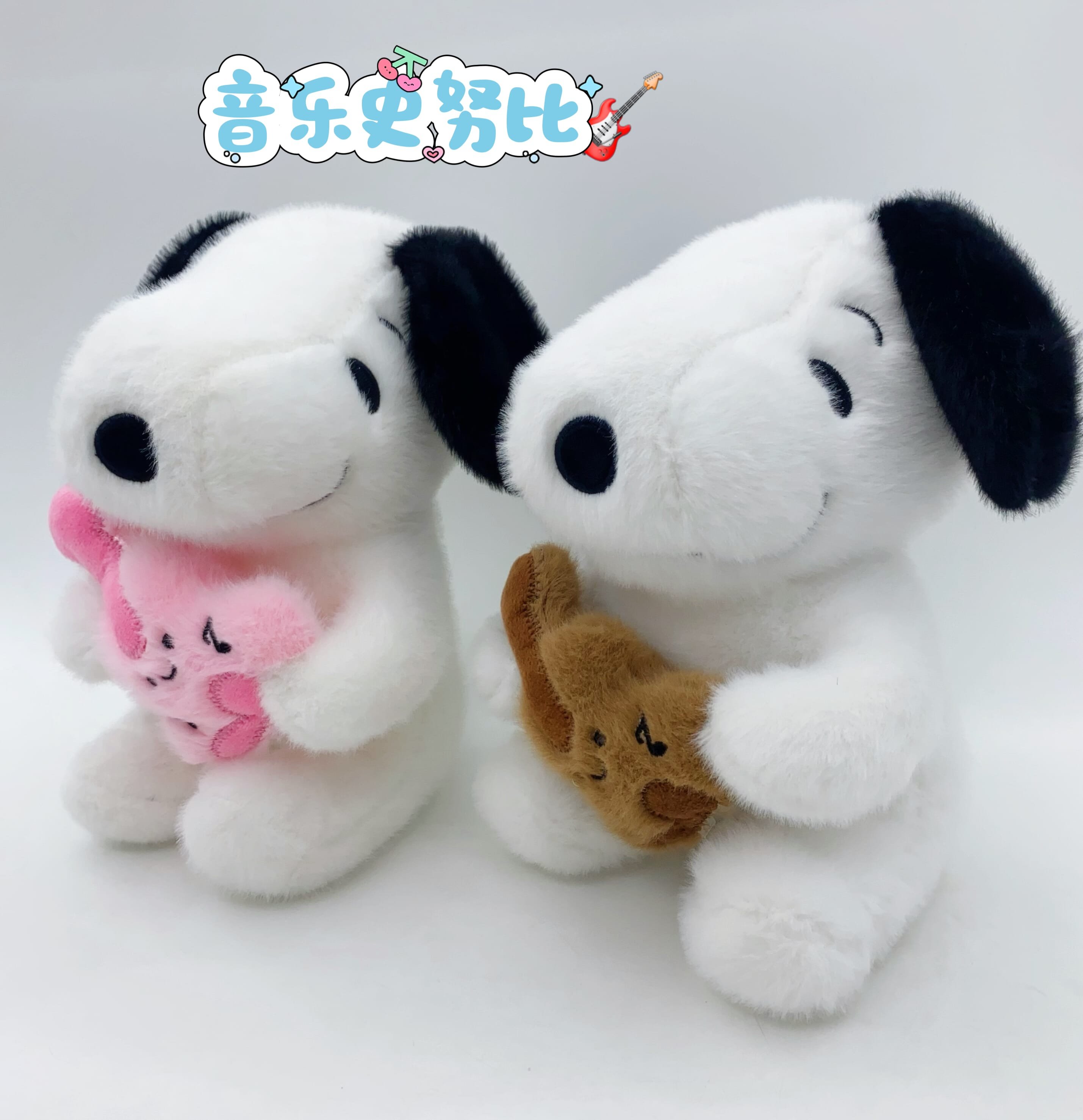 Peluche Snoopy con Guitarra 25cm